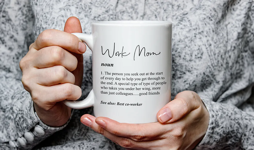 Mum and baby holding Printerpix cartoon design custom mug with dad text