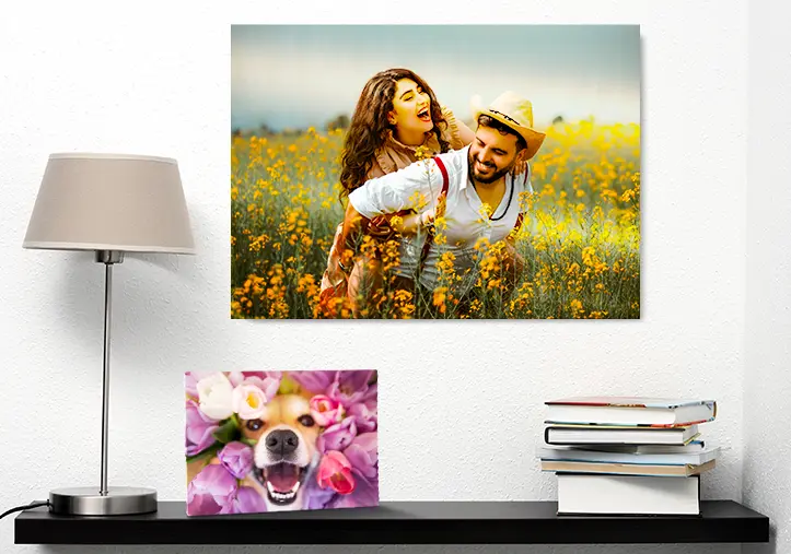 Aluminium photo print of a moutain and a lake being held by woman made by Printerpix