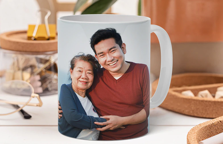 Personalised photo mug with picture of baby crawling wearing animal overall