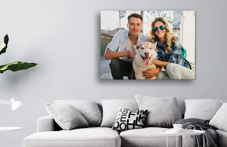 two photo collage canvas prints on wall