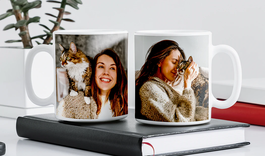 Personalised Photo Mug|Mum and baby holding Printerpix cartoon design custom mug with dad text|Personalised photo mug with picture of baby crawling wearing animal overall|Mom and daughter holding custom designed photo mugs with family photos|Kissing couple with personalized mugs with text on|Personalised photo mug with your own photo of a dog on|||||