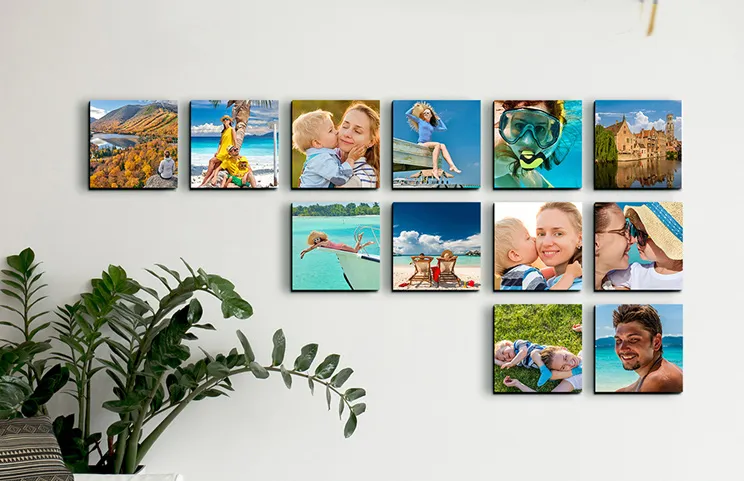 Photo Tiles Prints|Young boy reaching for cookie jar next to Printerpix custom photo prints of family|Romantic couple dancing in lounge in front of three custom photo tile prints|Man holding black dog in front of three black and white photo prints of dog|Man and woman looking at six photo tile prints with pictures of kids on|Married couple cuddling in front of four photo prints of them on holiday|||||