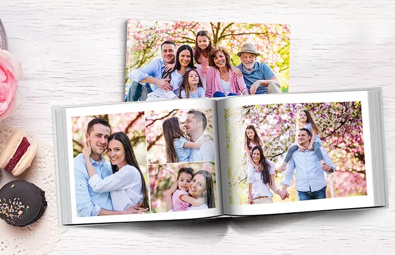 Custom printed Printerpix photo album with hard cover and large photos of young couple