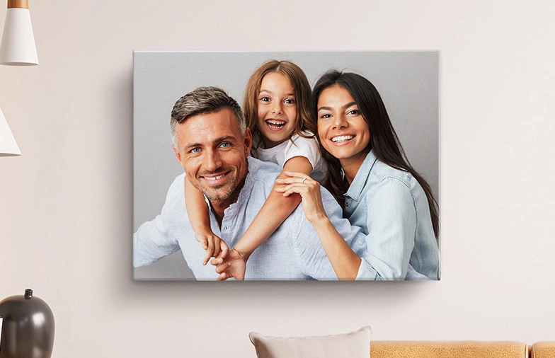 little smiling child in hood on canvas print