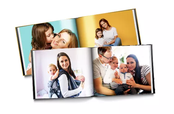 Hardcover Custom Photo Book|Custom printed Printerpix photo album with hard cover and large photos of mother and daughter|Printed personalized photo book with pictures of mother and son and photo cover|Holiday photo album with custom photo printed cover|Personalized photo book printed with pictures of the football team and the photo cover|Family photo album with custom printed cover and family name text|||||